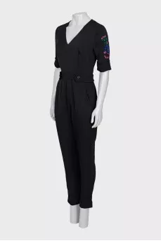 Black jumpsuit with a patch