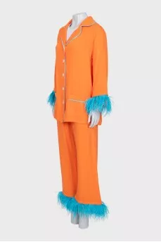 Orange suit with ostrich feathers