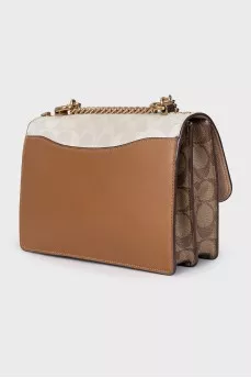 Leather bag with signature print