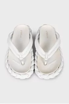 Leather flip-flops with a shaped sole