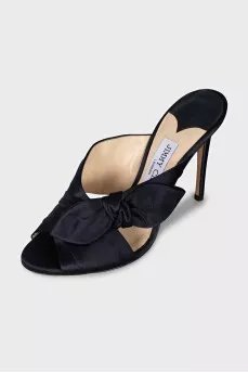 Black textile mules with a bow