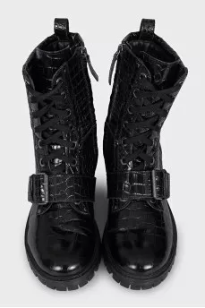 Leather boots decorated with buckles