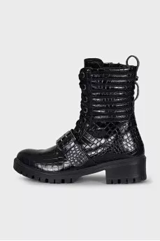 Leather boots decorated with buckles