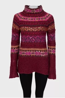 Long sweater decorated with sequins