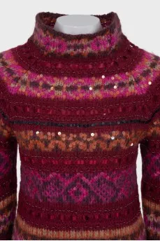 Long sweater decorated with sequins
