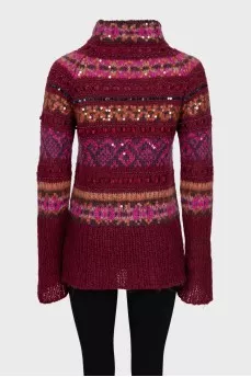 Long sweater decorated with sequins