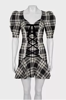 Plaid dress decorated with ties