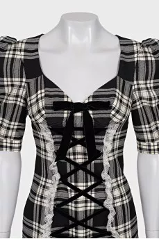 Plaid dress decorated with ties
