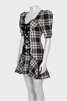 Plaid dress decorated with ties