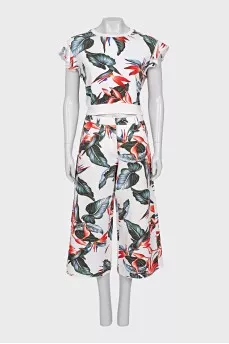 White suit with floral print trousers