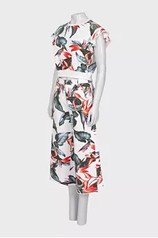 White suit with floral print trousers