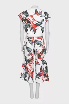 White suit with floral print trousers