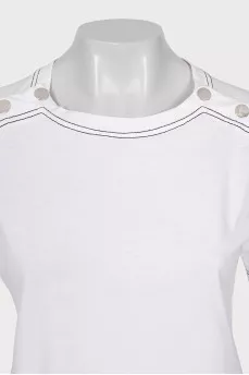 White T-shirt decorated with buttons