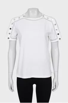 White T-shirt decorated with buttons