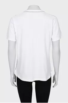White T-shirt decorated with buttons