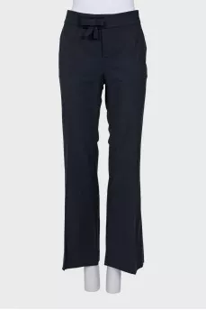 Flared trousers with a bow