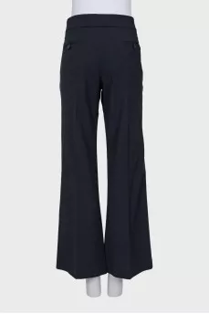 Flared trousers with a bow