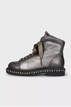 Leather boots with studs on the soles