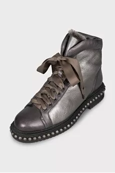 Leather boots with studs on the soles