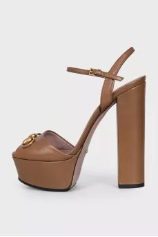 Brown sandals with gold decor