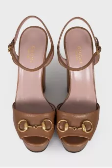 Brown sandals with gold decor