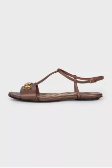 Leather sandals with signature decor