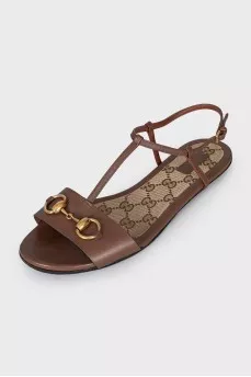 Leather sandals with signature decor
