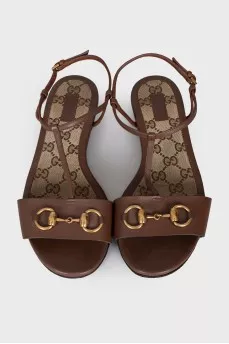 Leather sandals with signature decor