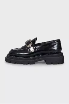 Black leather loafers with tag