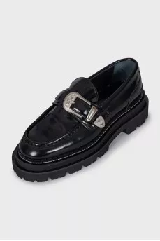 Black leather loafers with tag