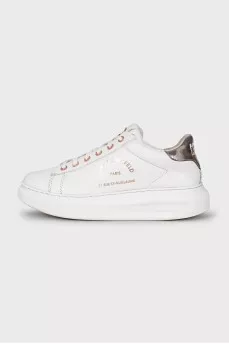 White leather sneakers with brand logo