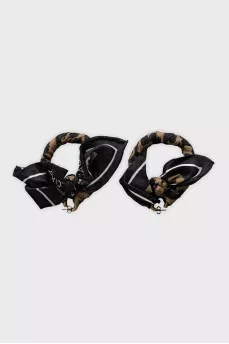 Round earrings made of metal and textile