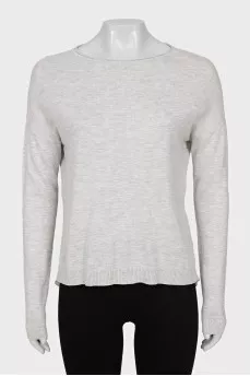 Jumper decorated with pleats