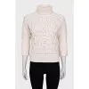 Sweater with voluminous decor