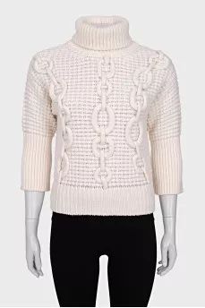 Sweater with voluminous decor