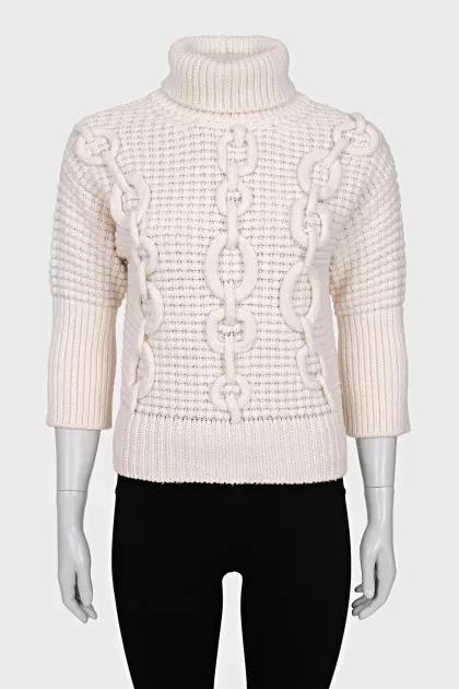 Sweater with voluminous decor