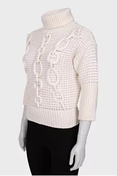 Sweater with voluminous decor