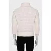 Sweater with voluminous decor