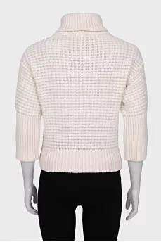 Sweater with voluminous decor