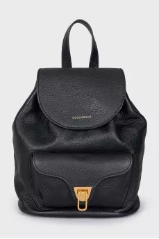 Black leather backpack with gold hardware