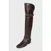 Brown leather over-the-knee boots with buckle