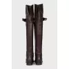Brown leather over-the-knee boots with buckle