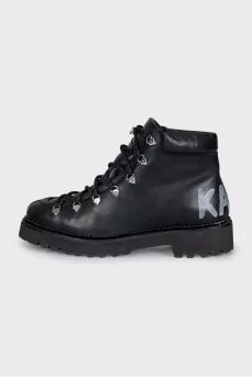 Leather boots with a brand logo
