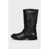 Quilted leather boots with straps