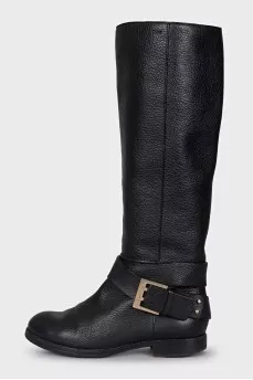 Black boots with a gold buckle