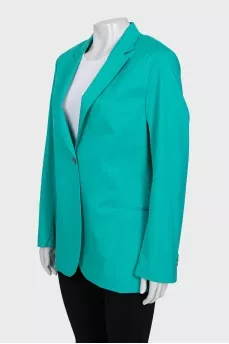 Green jacket with a tag