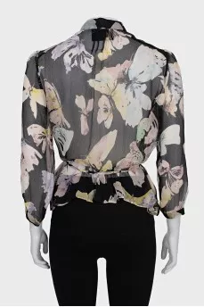 Sheer black blouse with floral print