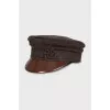 Brown cap with a patent leather visor