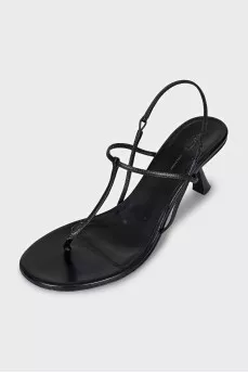 Black sandals with a figured heel