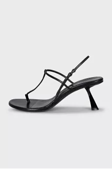 Black sandals with a figured heel